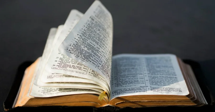 An open Bible, illustrating Psalm 119:105: Thy word is a lamp unto my feet